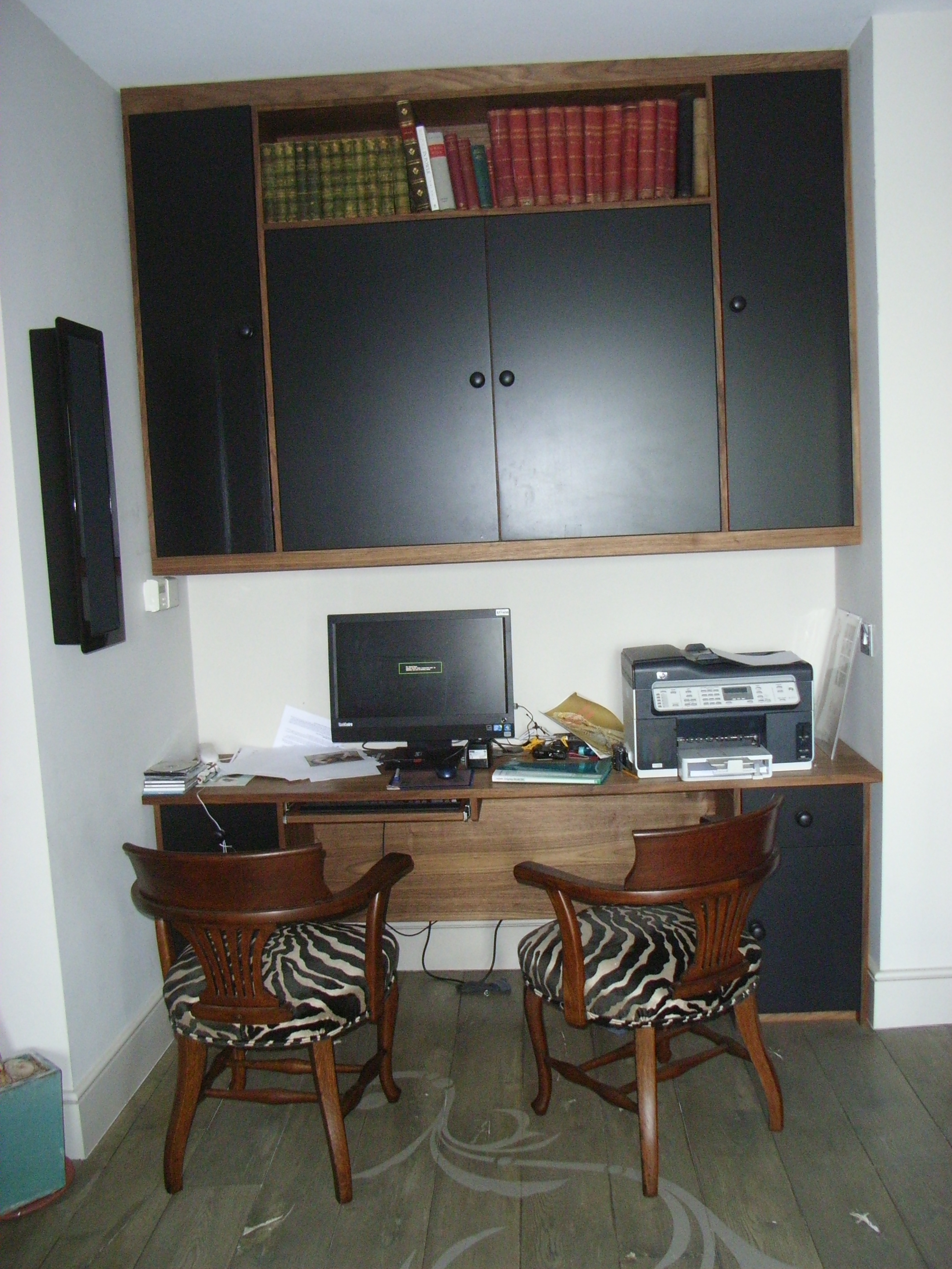 home office bepoke desk and storage in american dark walnut with black eggshell doors