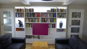TV hidden in wall unit