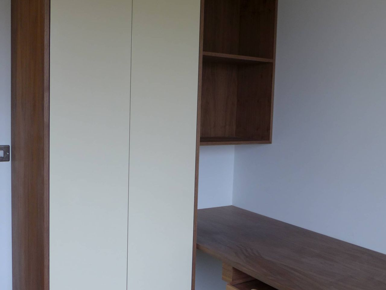 american dark walnut units with ivory gloss painted doors