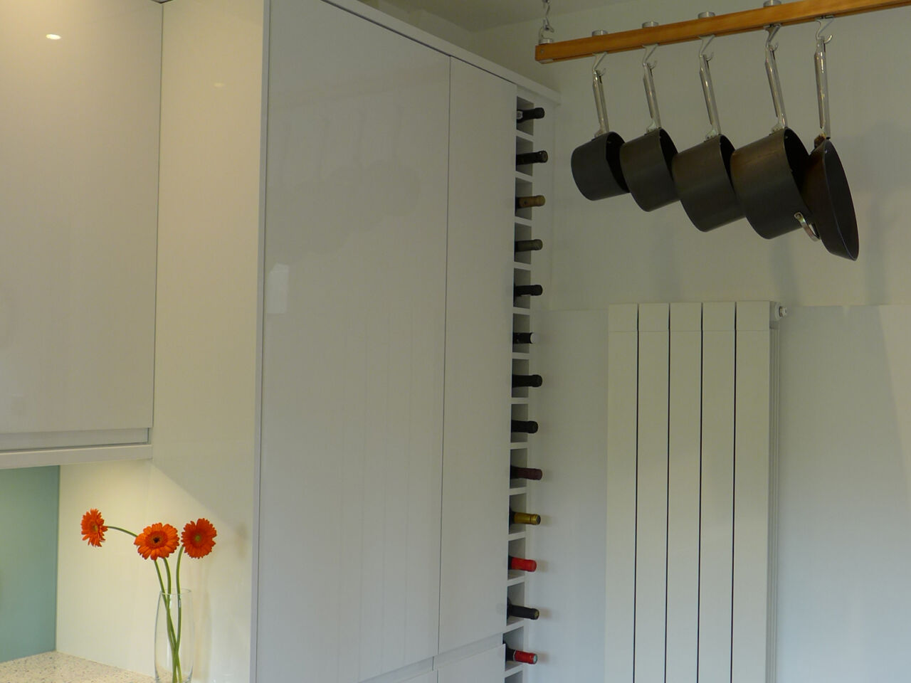 tall wine rack makes good use of narrow space