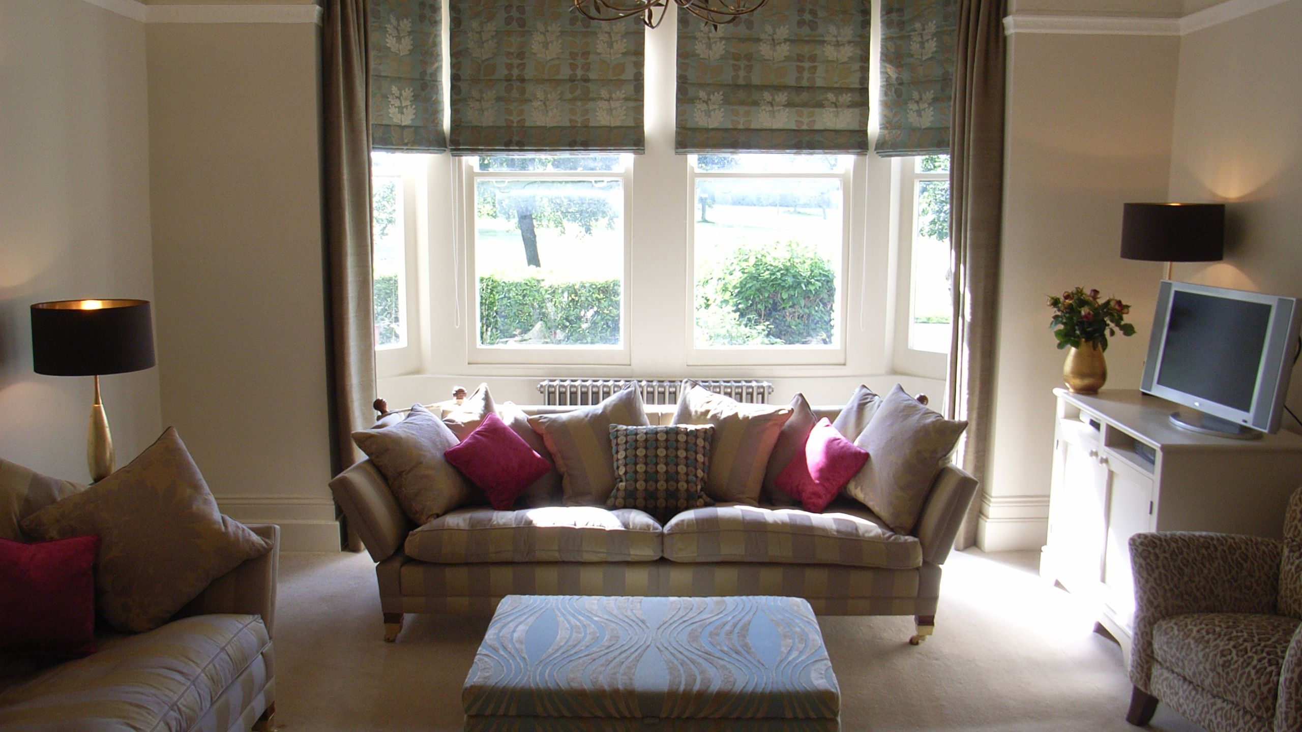 roman blinds and dress curtains