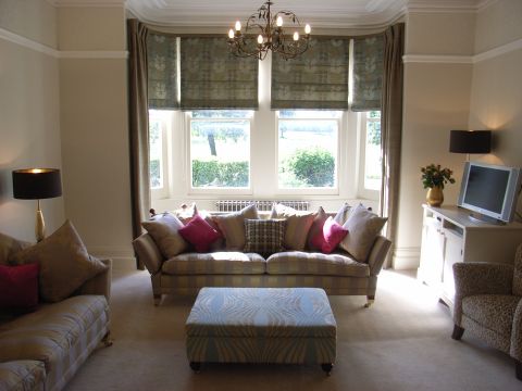 roman blinds and dress curtains