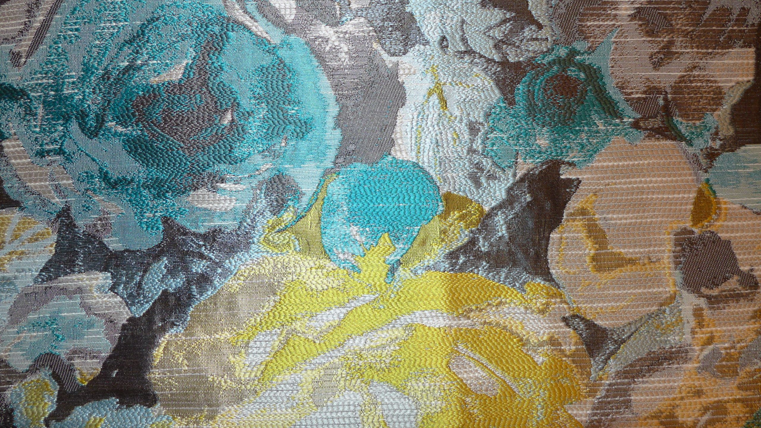 patterned aquamarine and gold fabric