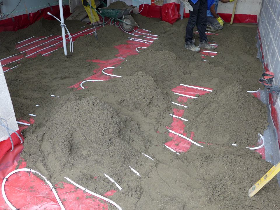 screed piled on floor