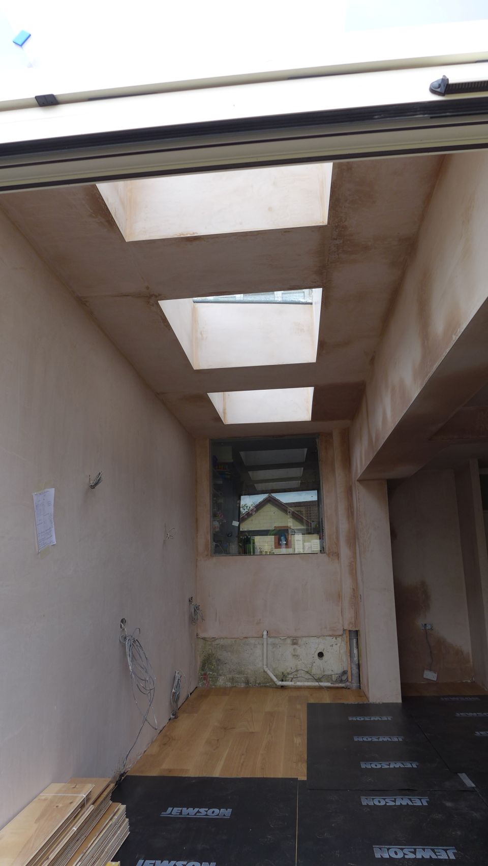 plastered walls and ceilings in new extension