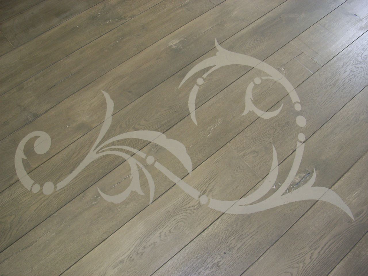 much underused, floor stencilling is a great way to enhance a wooden floor