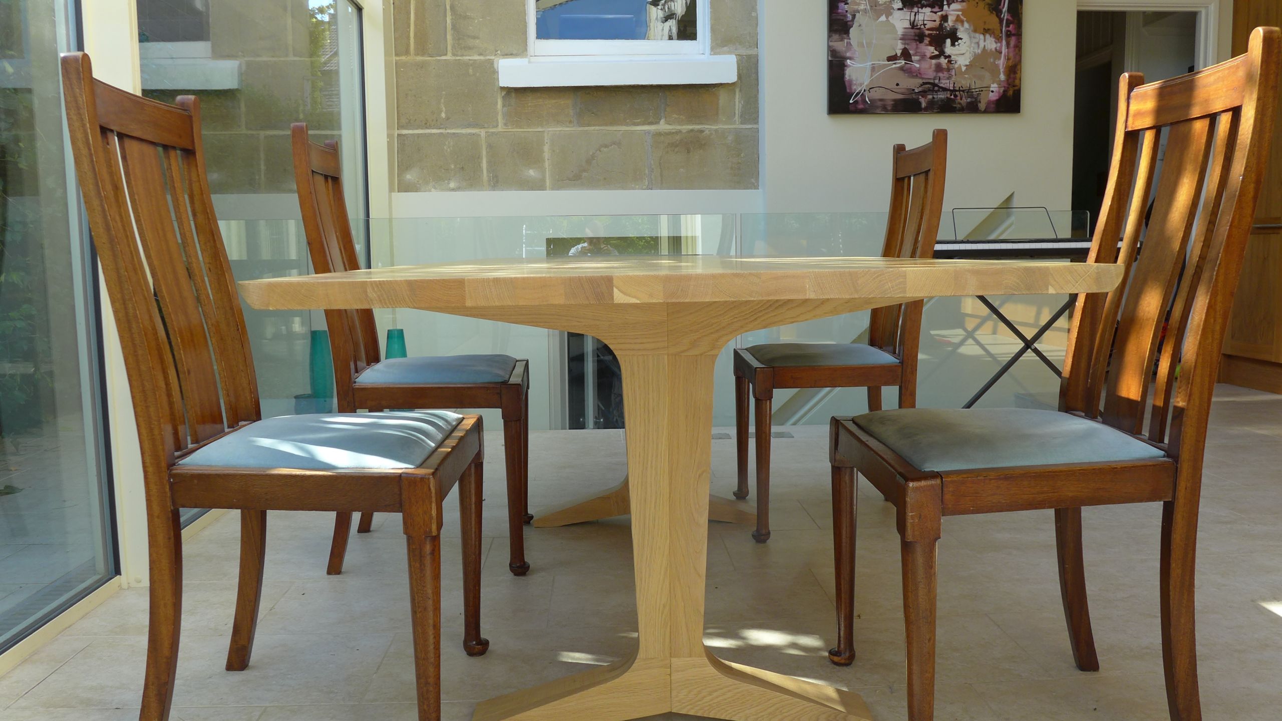 oak dining table in glass extension
