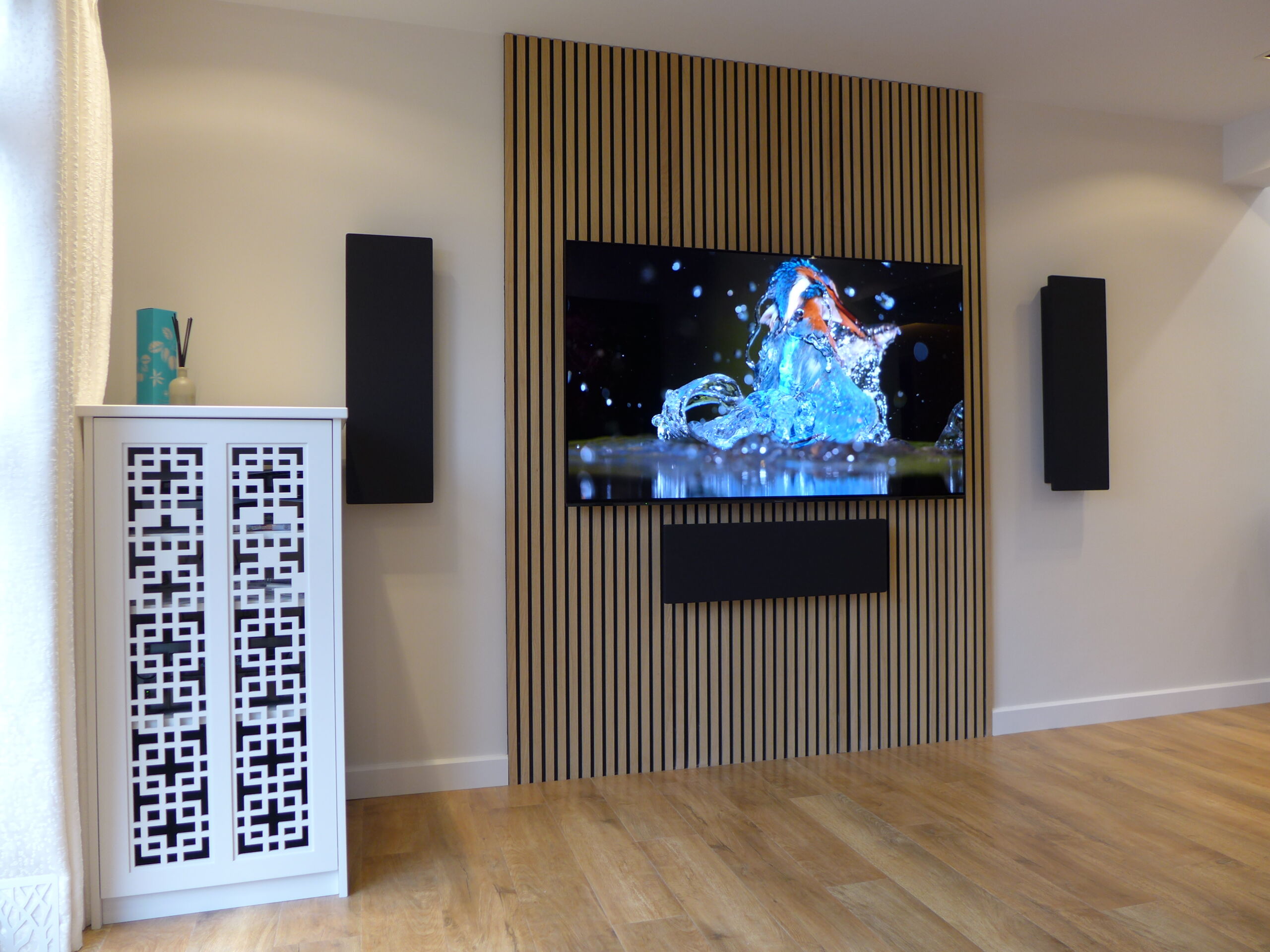 LCD TV with wall speakers