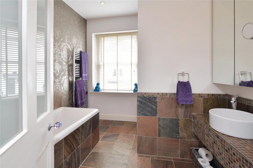 bathroom with natural tiles
